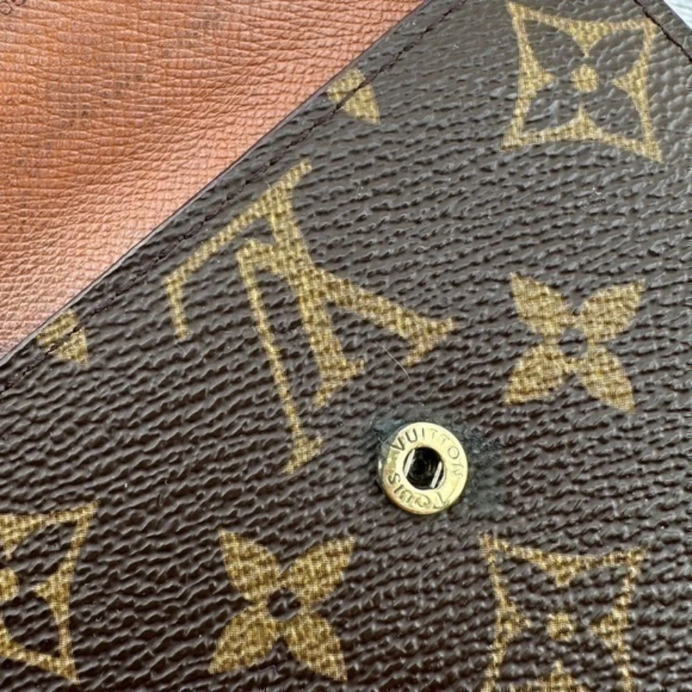 AUTHENTIC Louis Vuitton Elise compact wallet. Monogram canvas.